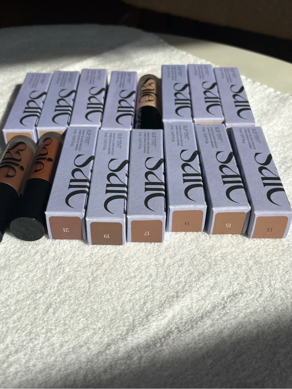 Saie Slip Tint Lipstick Collection — Nude and Warm Brown Shades